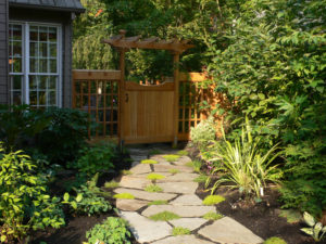 Landscape East West Fence with Rock Walkway